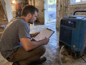 Dehumidifier check during structural drying in Dehumidification by Vault Mold Removal