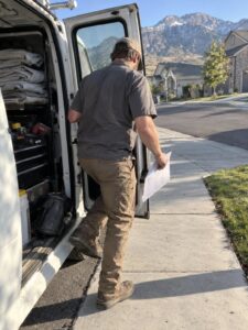 Technician arriving in a service area neighborhood in Mapleton Ut by Vault Mold Removal
