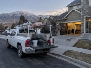 Work truck parked on a residential street in Lindon Ut by Vault Mold Removal