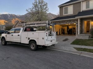 Work truck parked on a residential street in Springville Ut by Vault Mold Removal