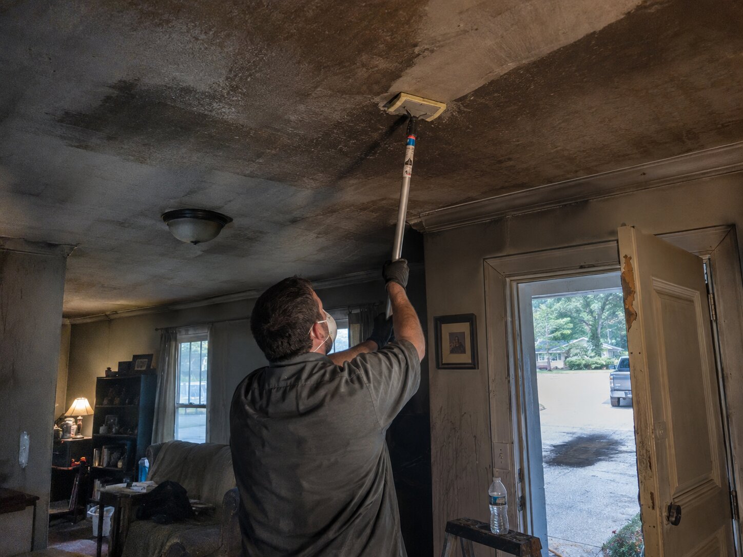 Dry sponge soot removal from a ceiling by Vault Mold Removal