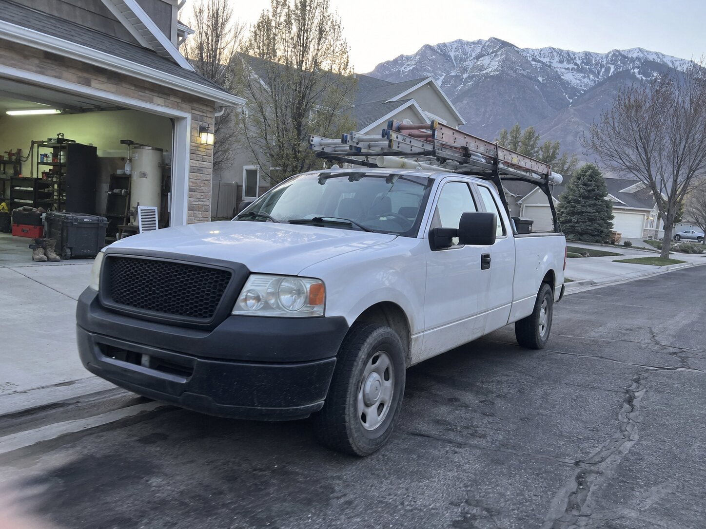 Work truck parked on a residential street in Provo Ut by Vault Mold Removal